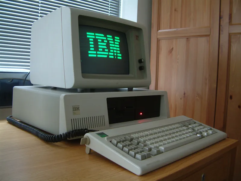 An old IBM PC with a green-screen monitor